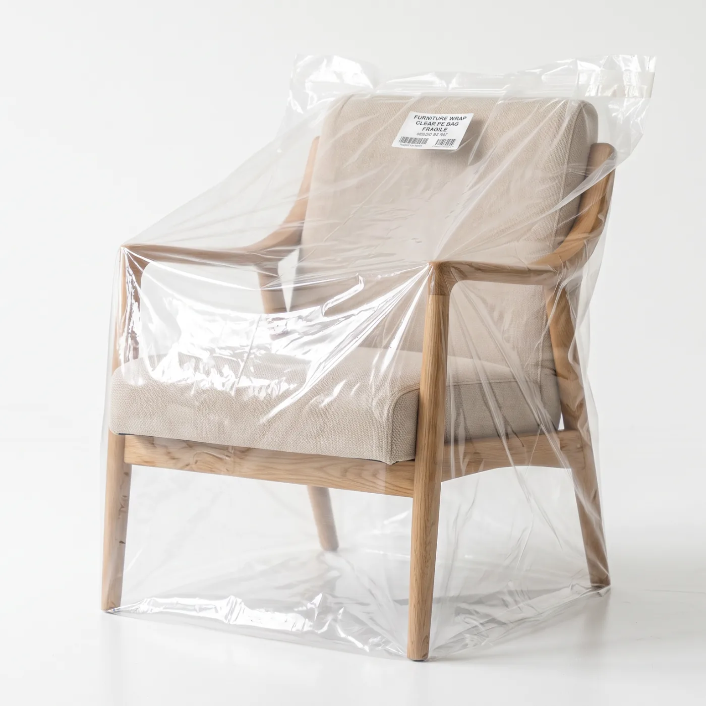 Armchair in a clear PE furniture bag